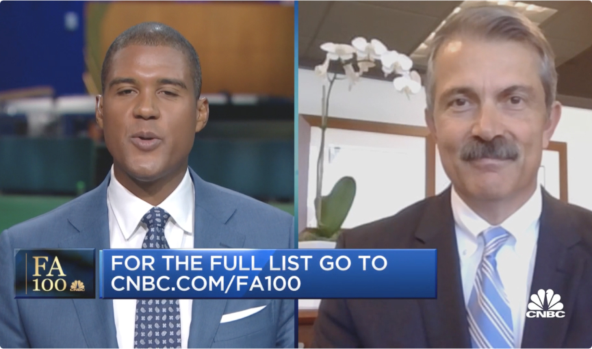 A screenshot of George Farra on the CNBC program "The Halftime Report" to discuss Woodley Farra's #1 ranking in the FA100.